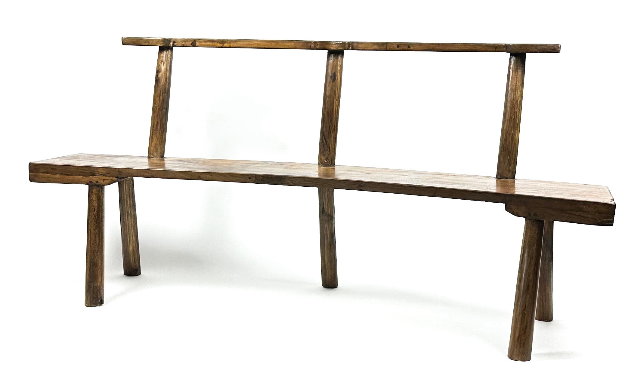 The curved teak bench