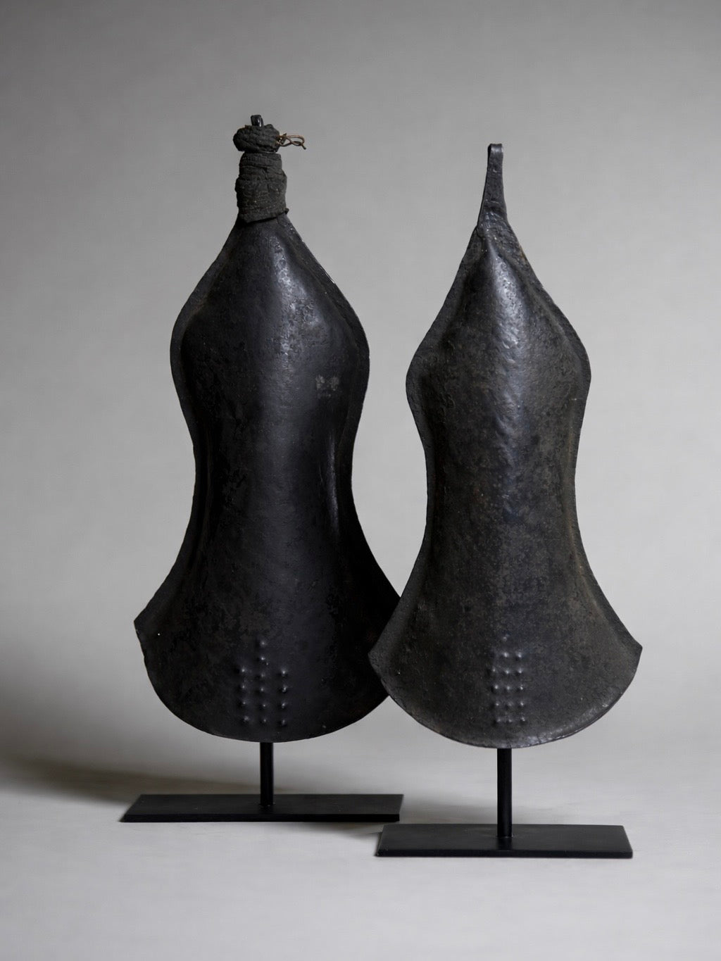 A pair of metal resonators from the Tetela culture of the Democratic Republic of the Congo