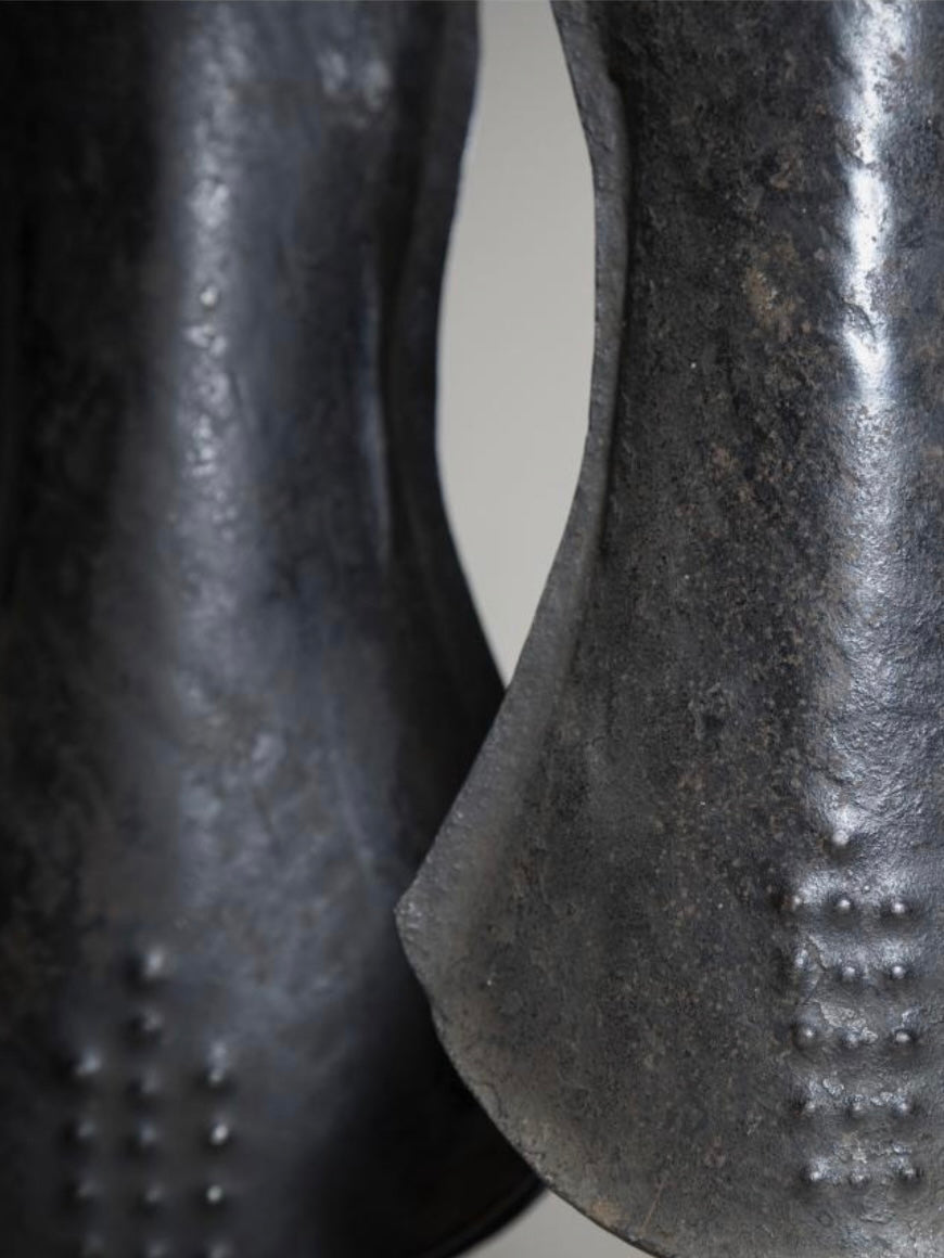 A pair of metal resonators from the Tetela culture of the Democratic Republic of the Congo