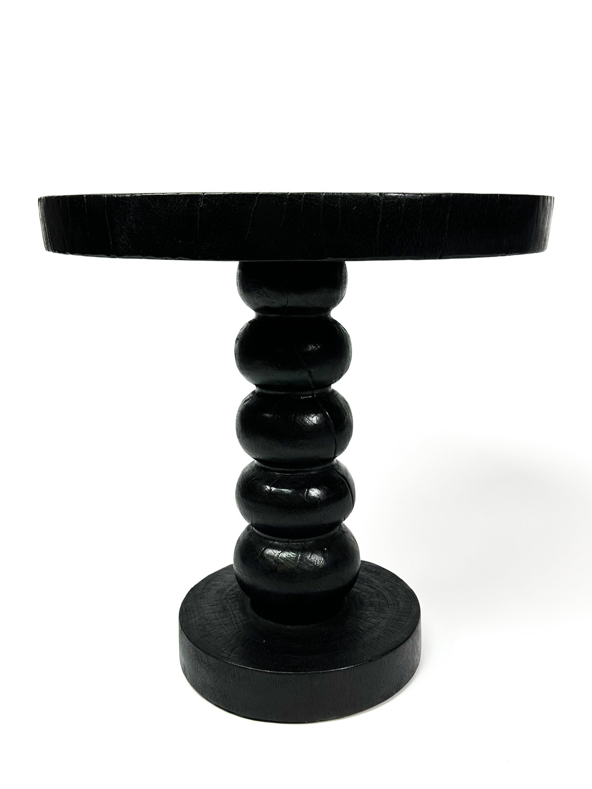 The black twisted round table