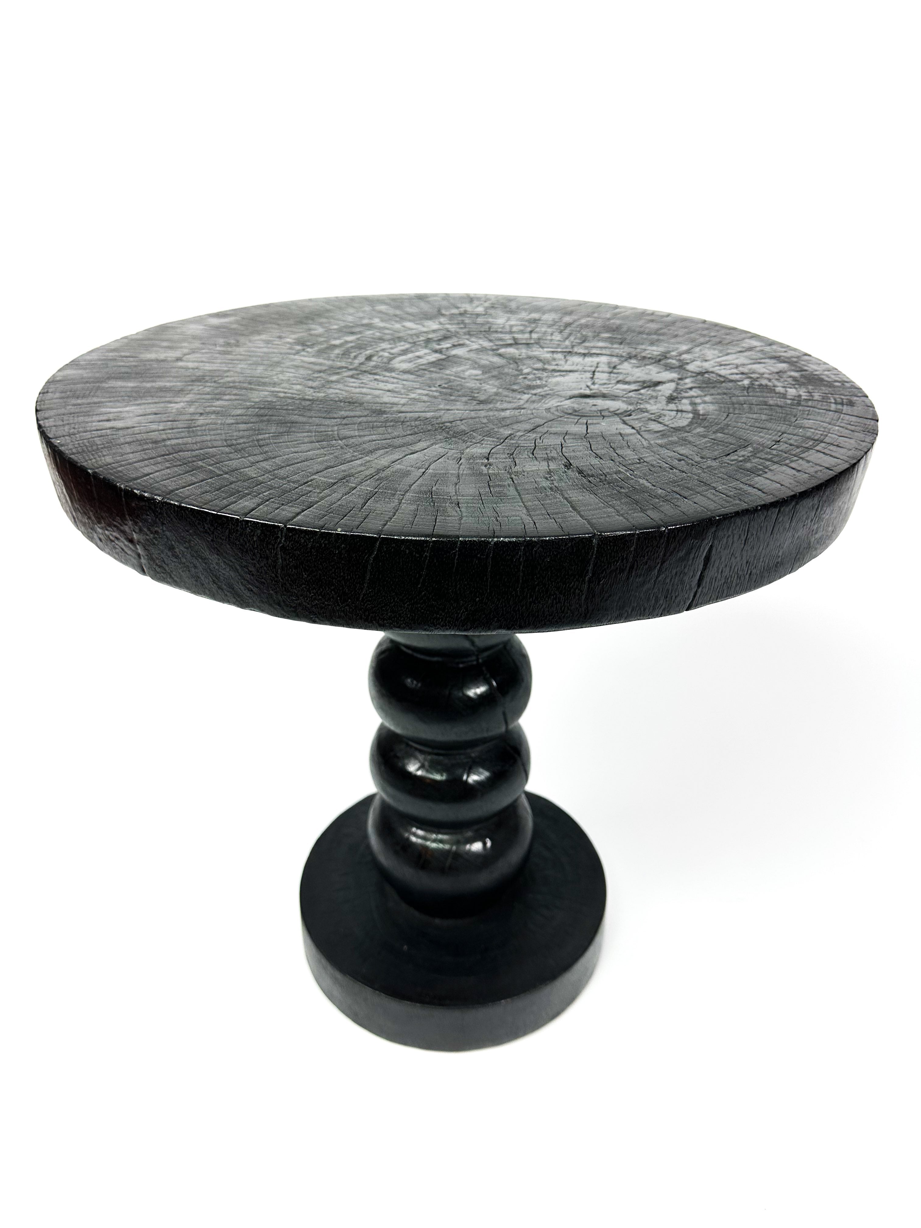 The black twisted round table