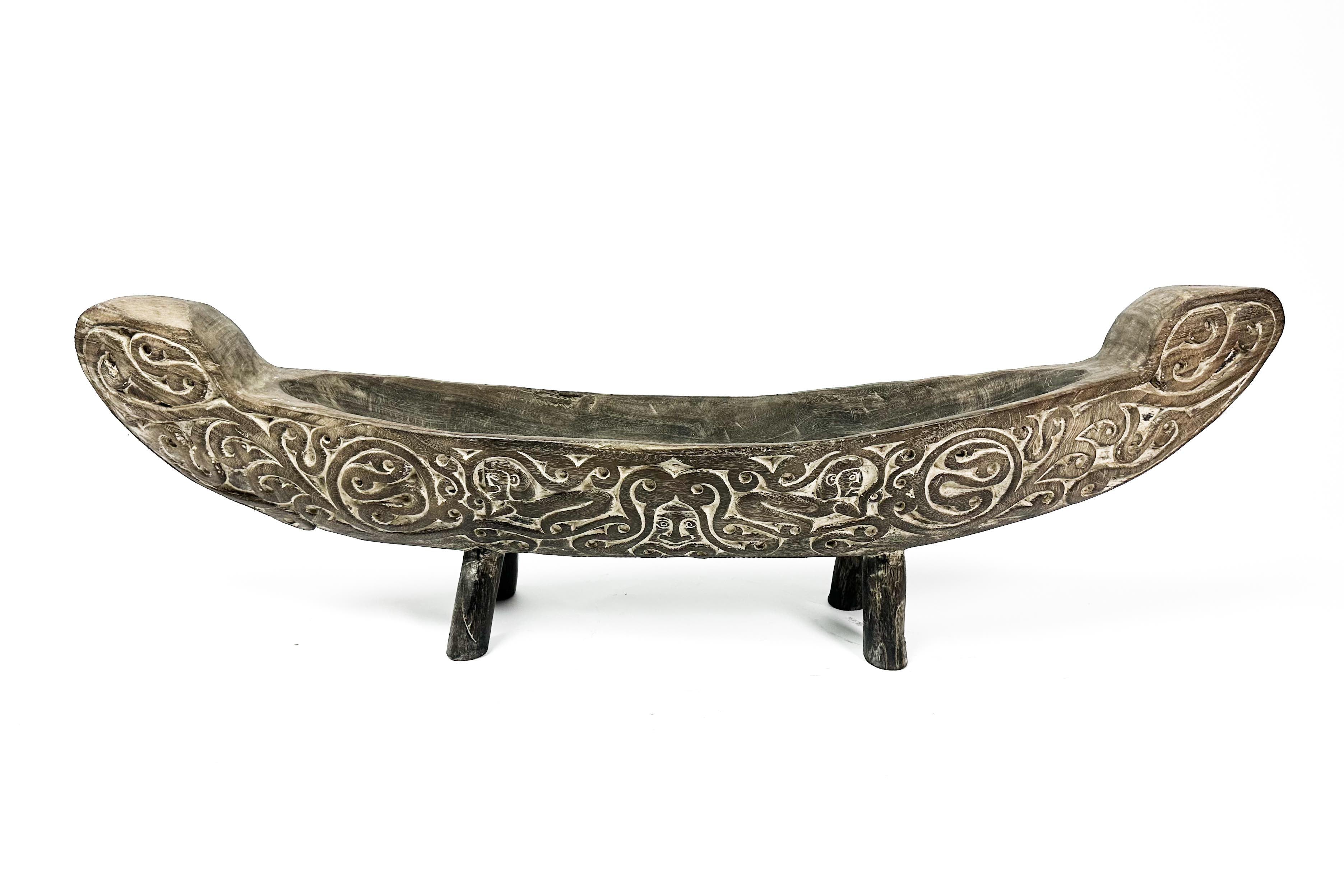 hand carved wooden boat