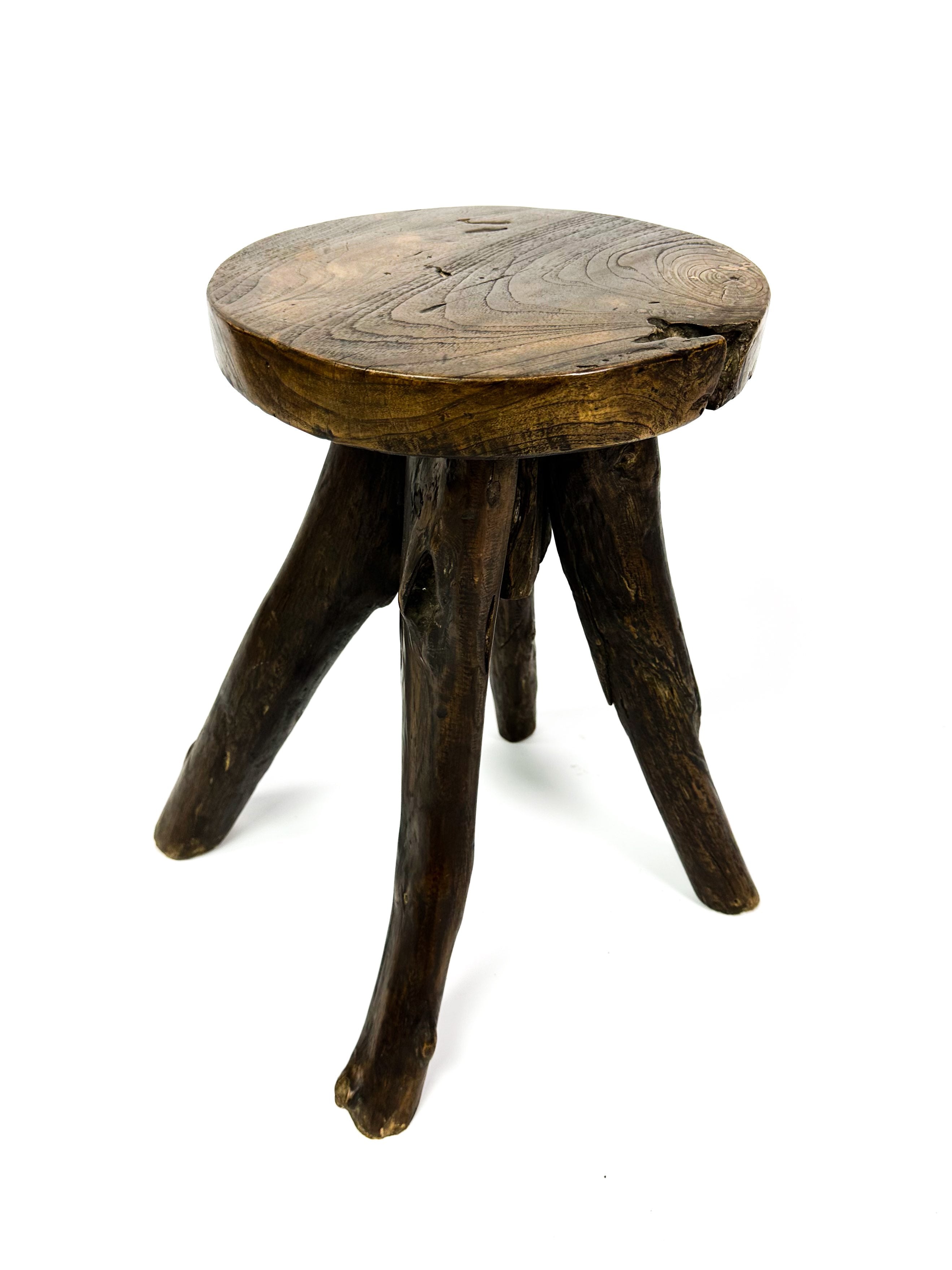 The teak 4-legged stool
