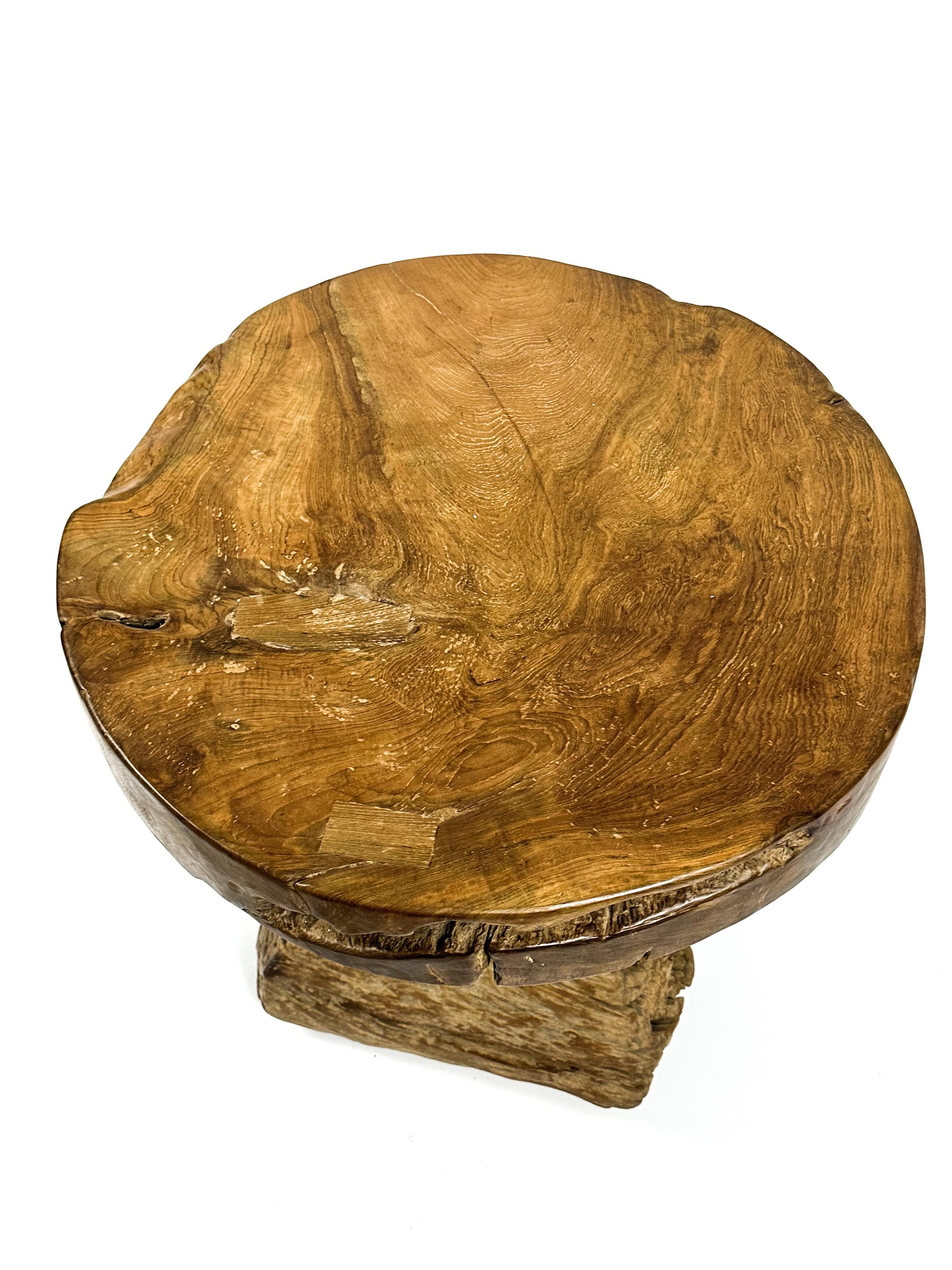 The teak round table