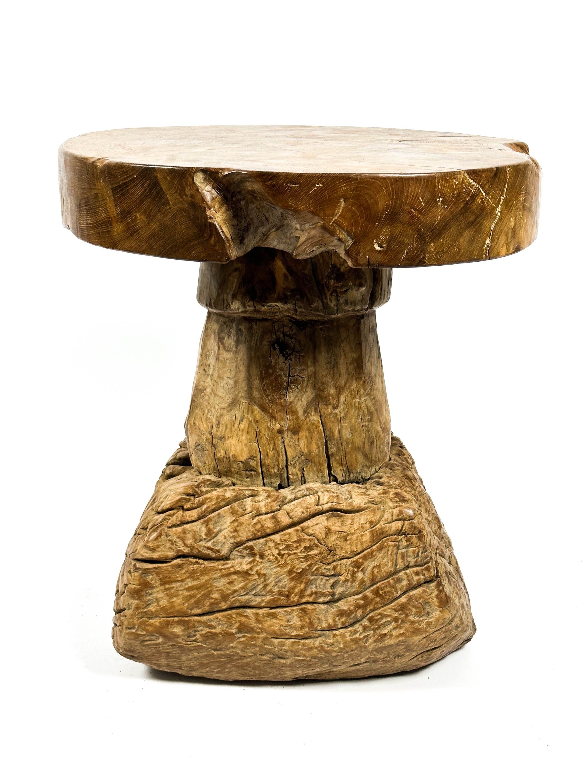 The teak round table
