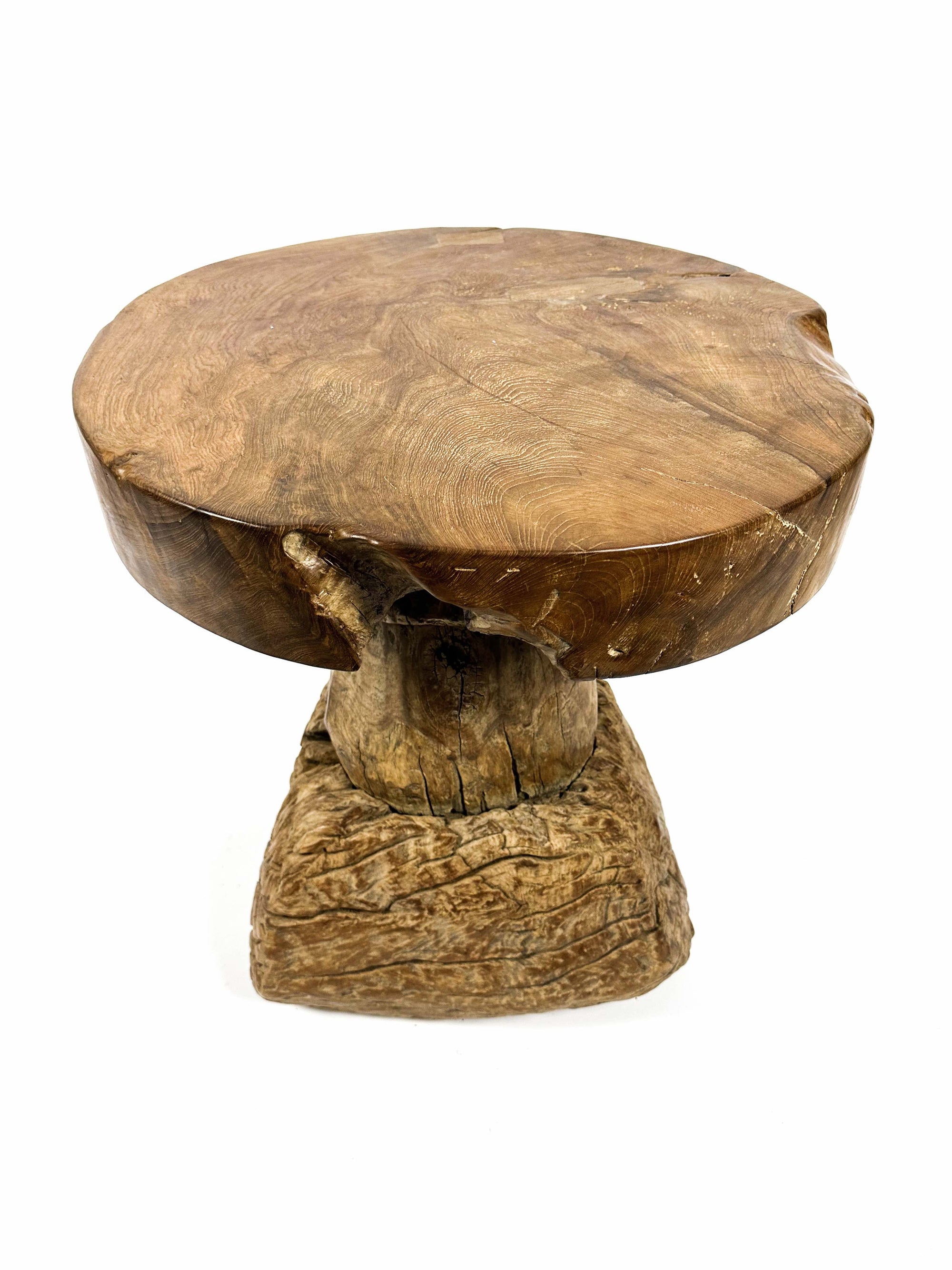 The teak round table