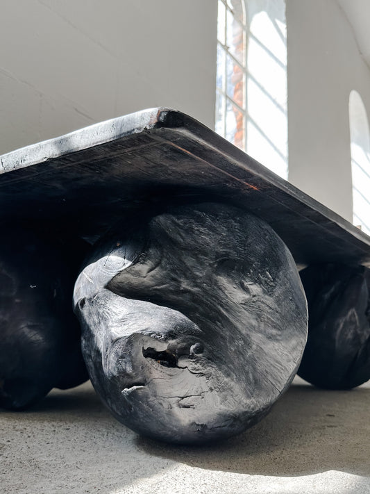 The black teak ball coffee table