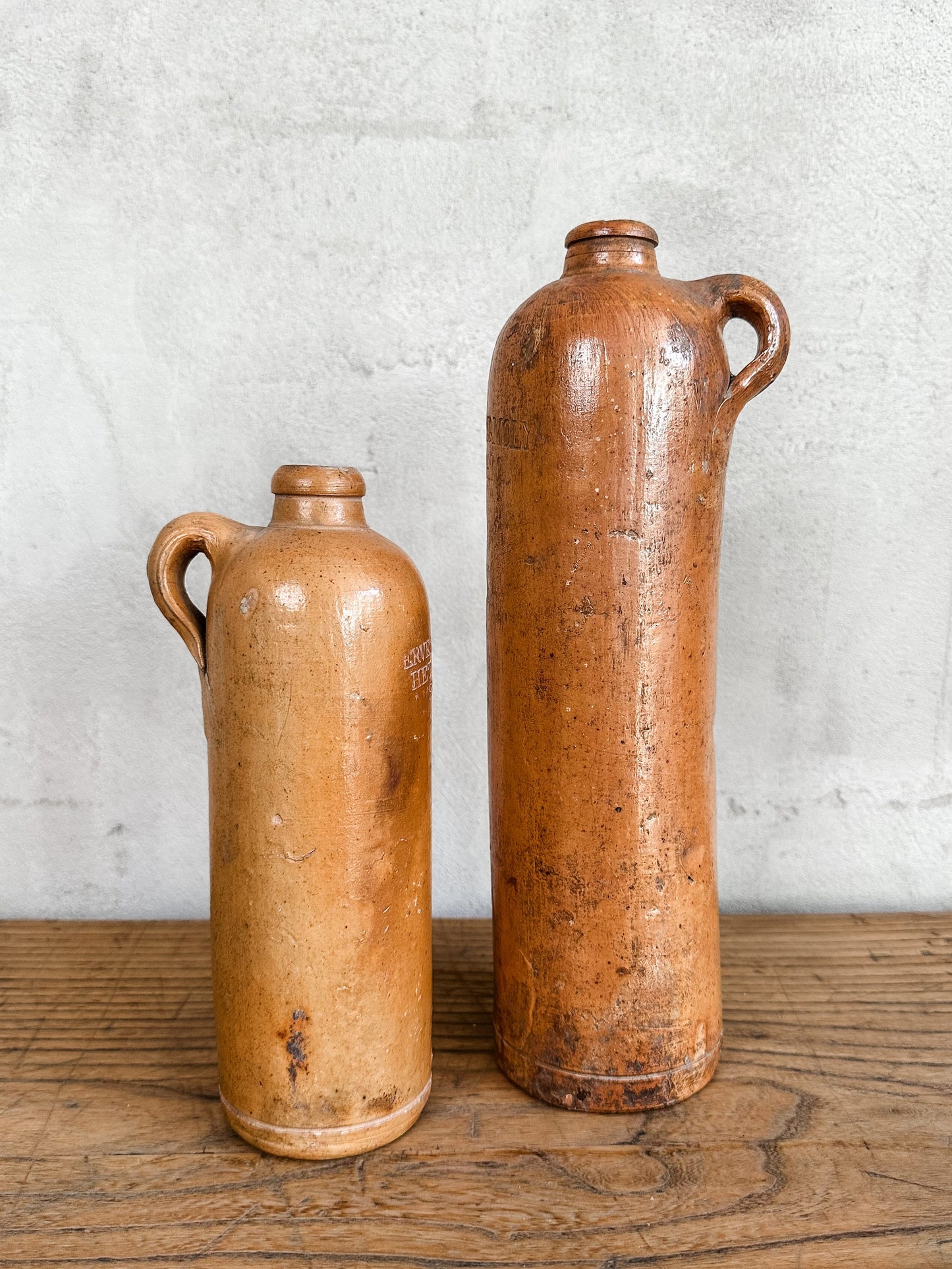 pair of old colonial river bottles