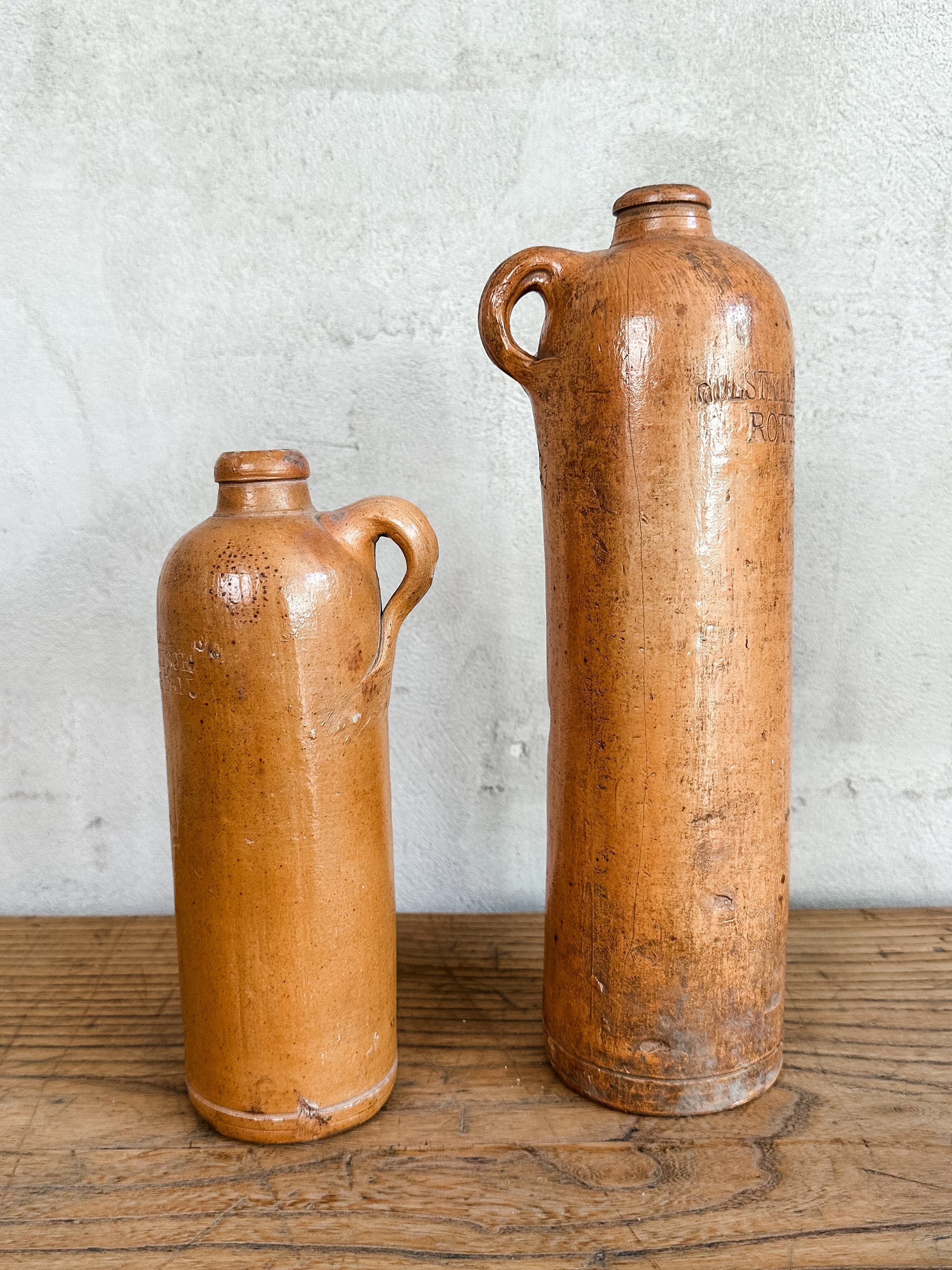 pair of old colonial river bottles