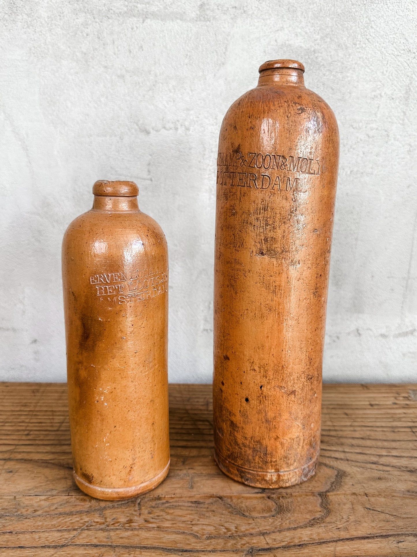 pair of old colonial river bottles