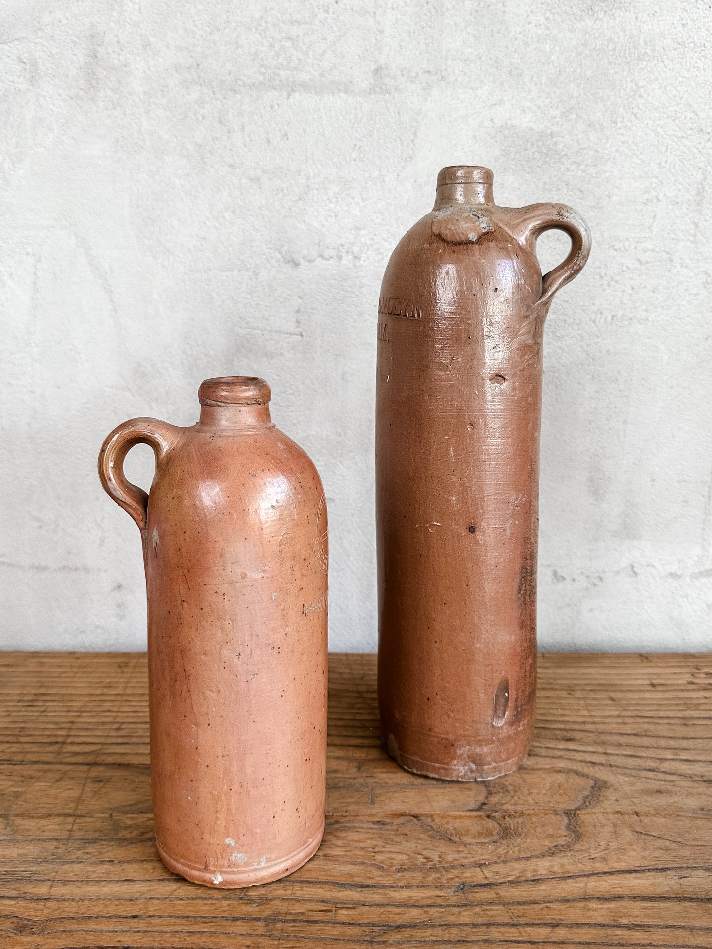 pair of old colonial river bottles