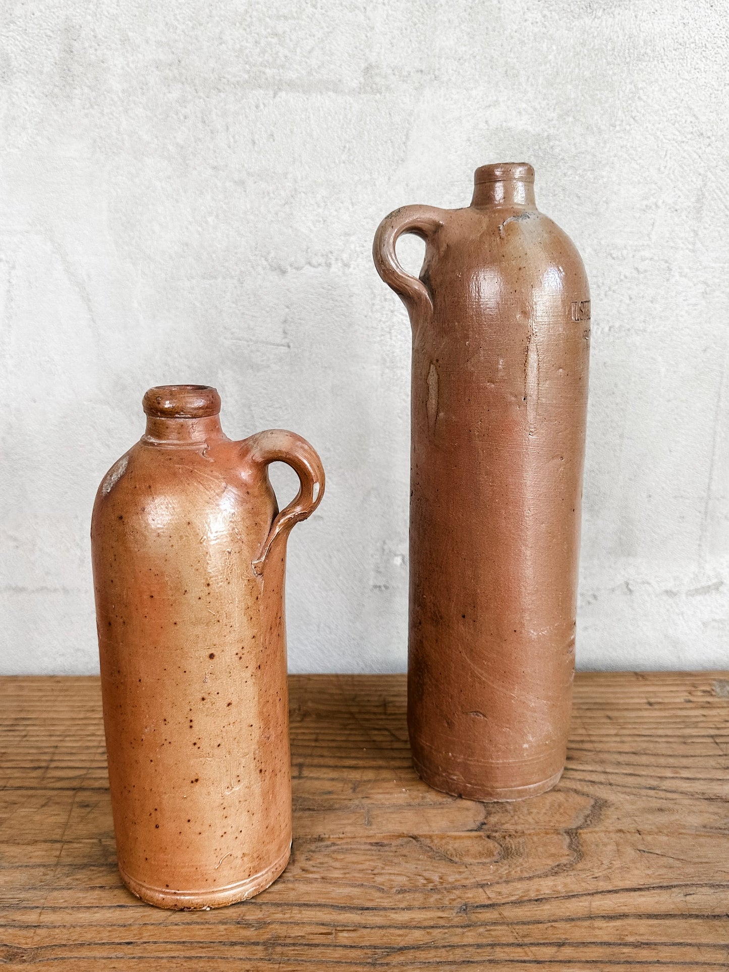 pair of old colonial river bottles