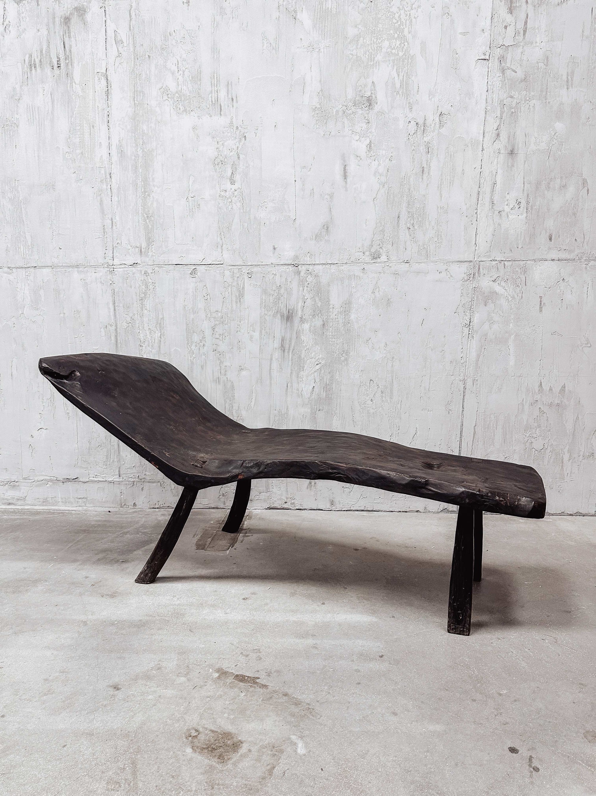 The burnt primitive bench