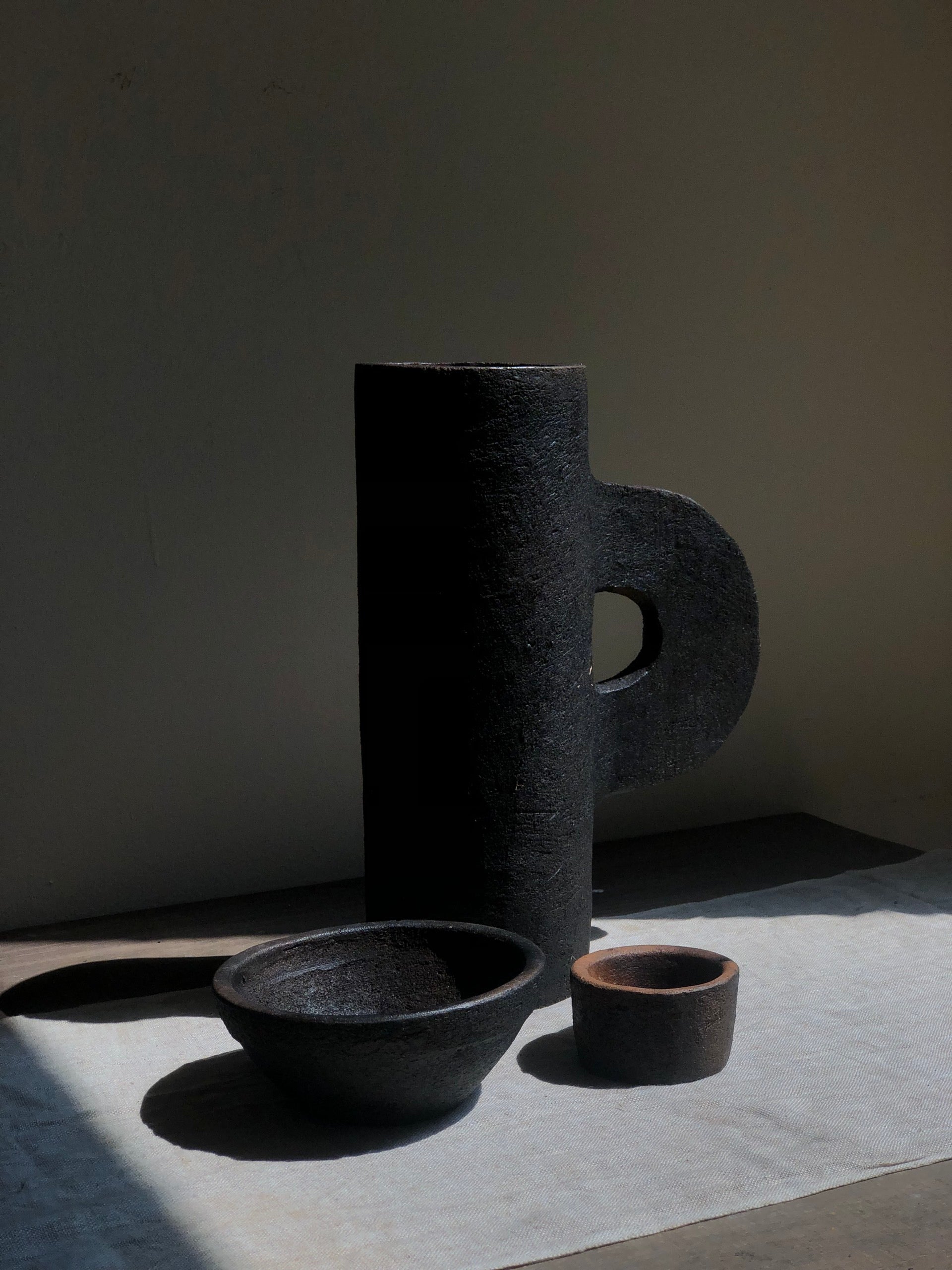 Vietnamese cylinder vase with handle