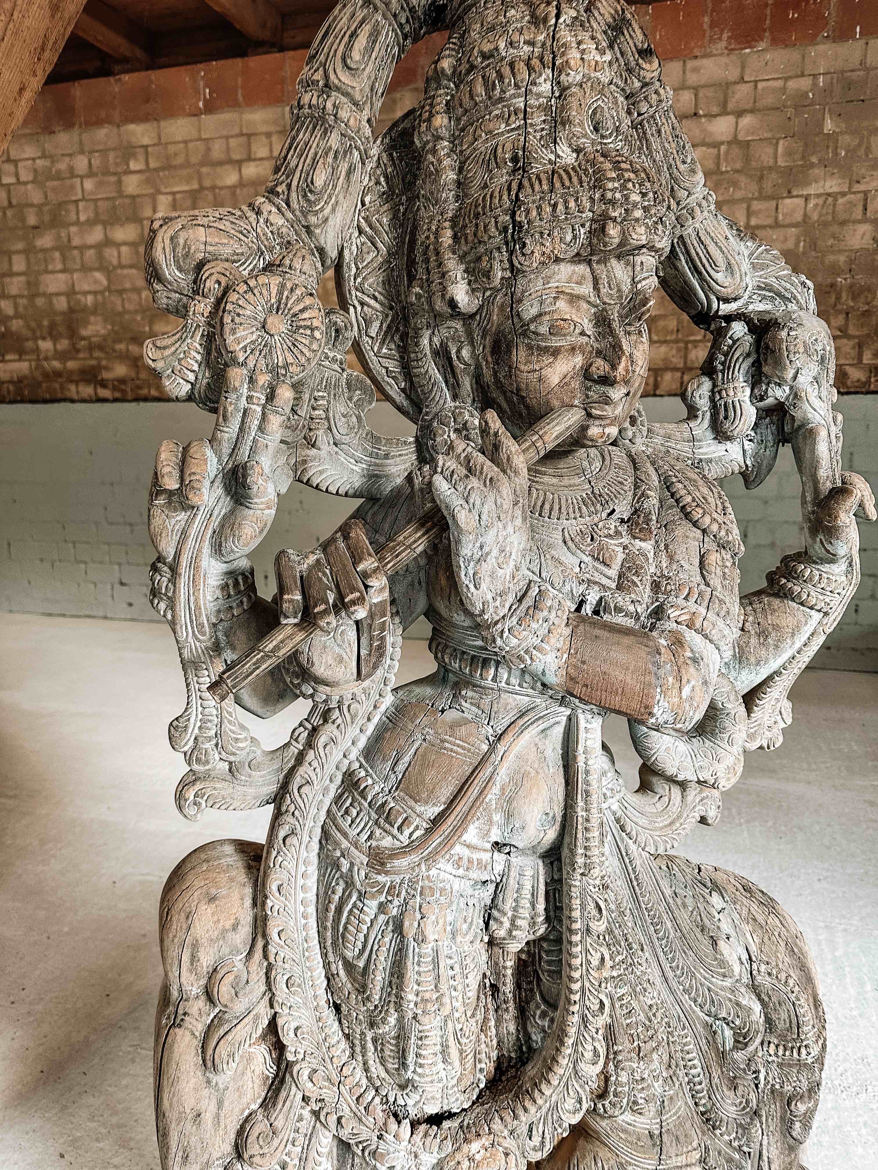 Old Indian wooden Krishna