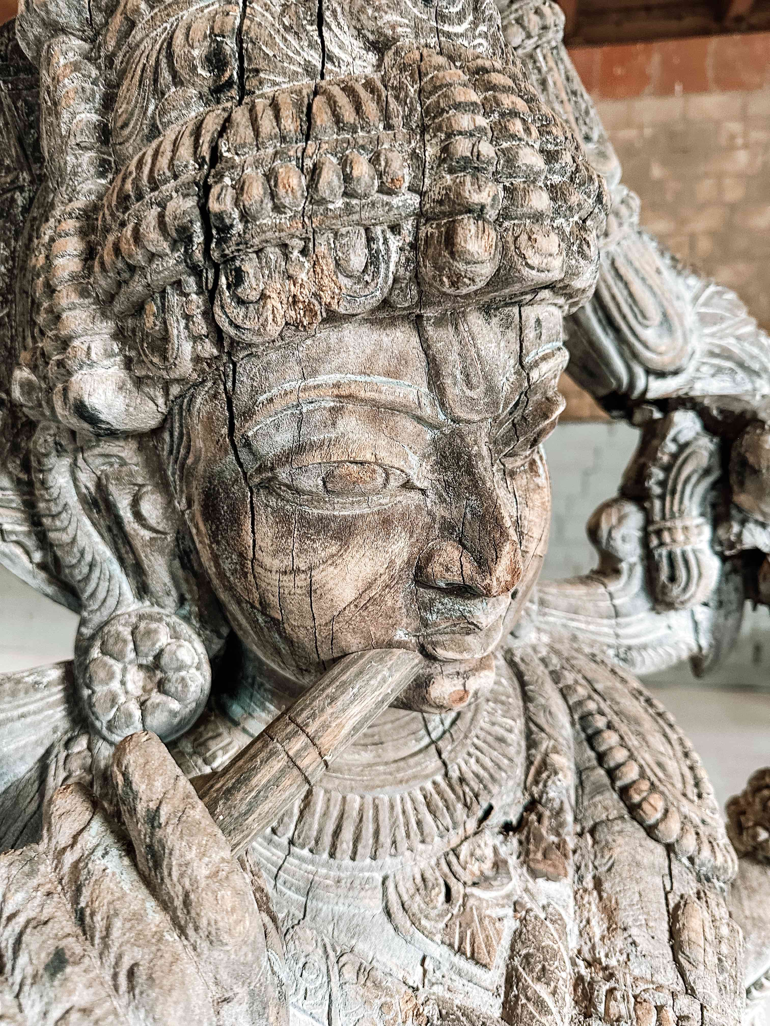 Old Indian wooden Krishna