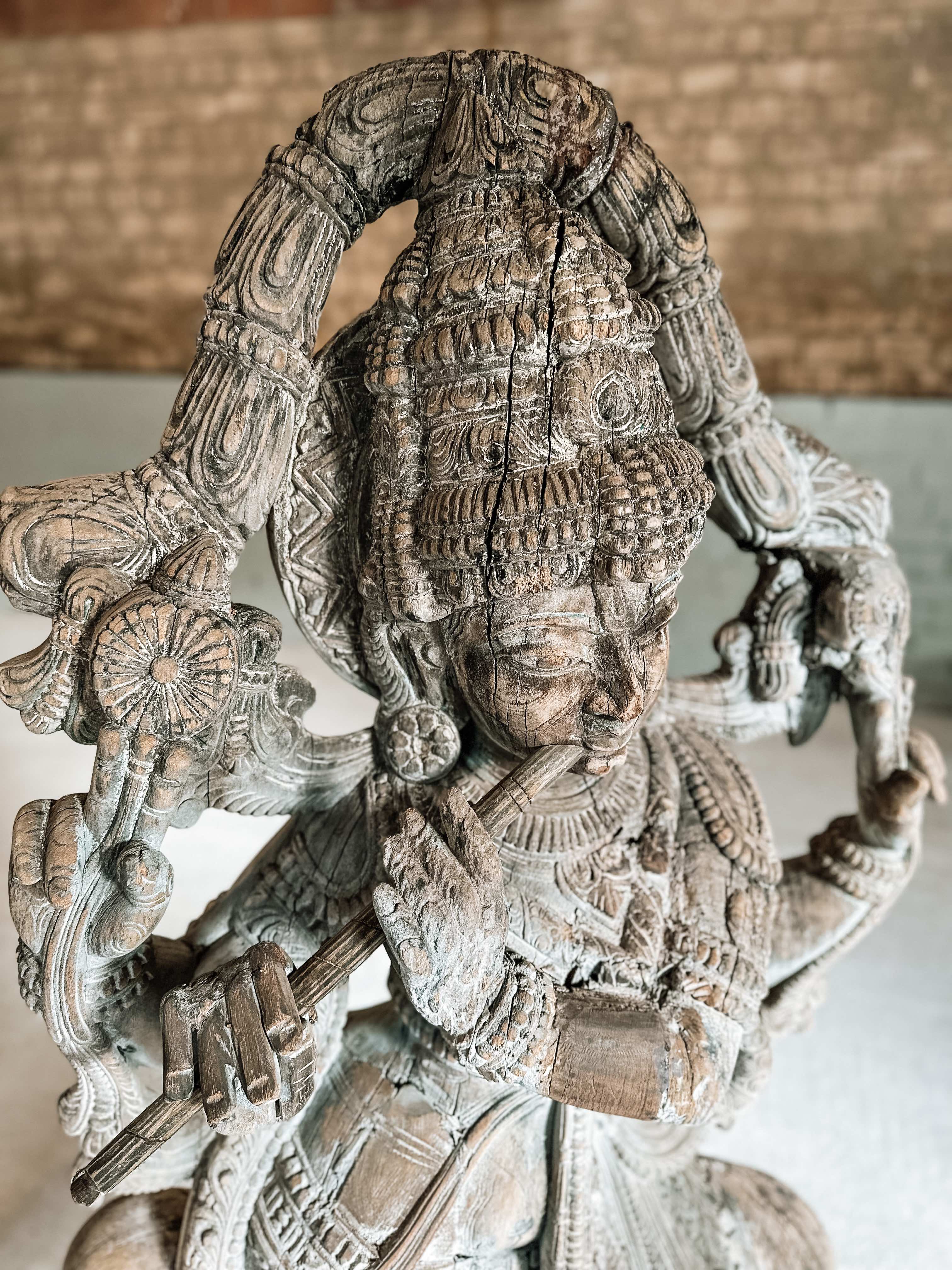 Old Indian wooden Krishna