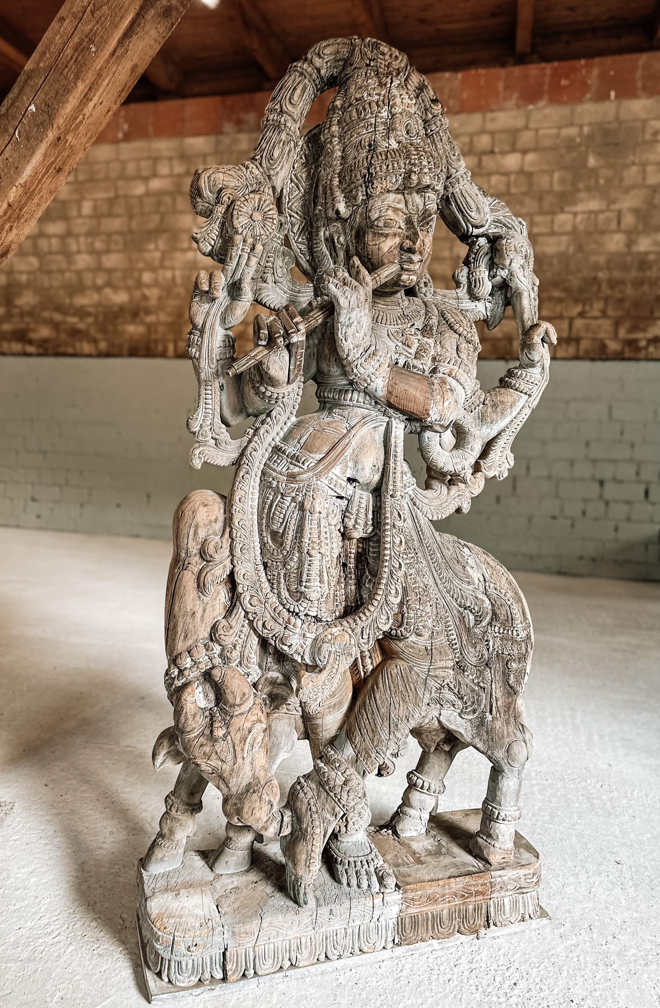 Old Indian wooden Krishna