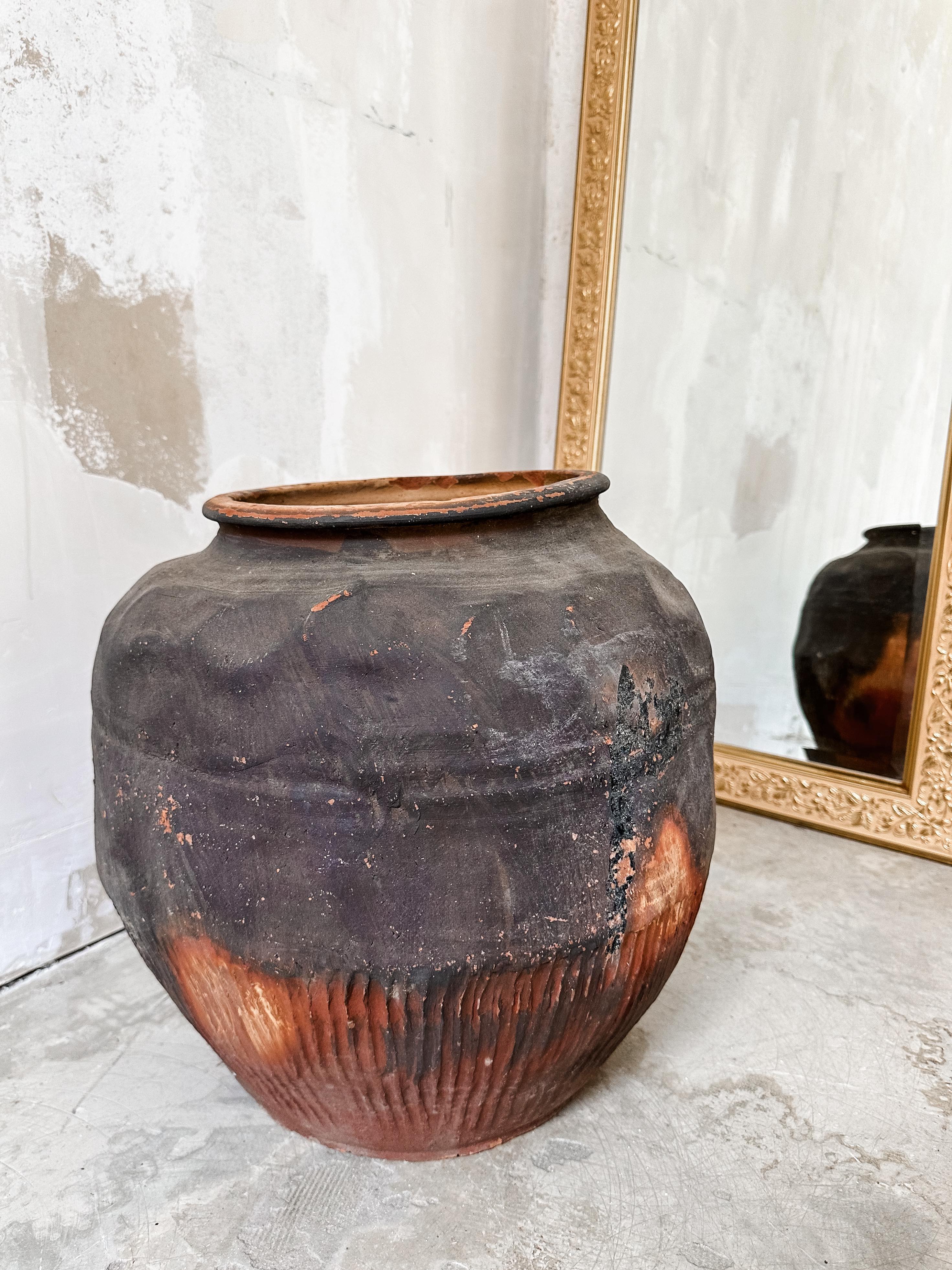 Unglazed terracotta pot #1