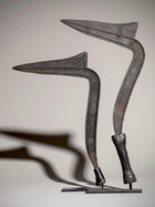 A pair of old metal Iboko scepters with wooden handles from the Democratic Republic of the Congo