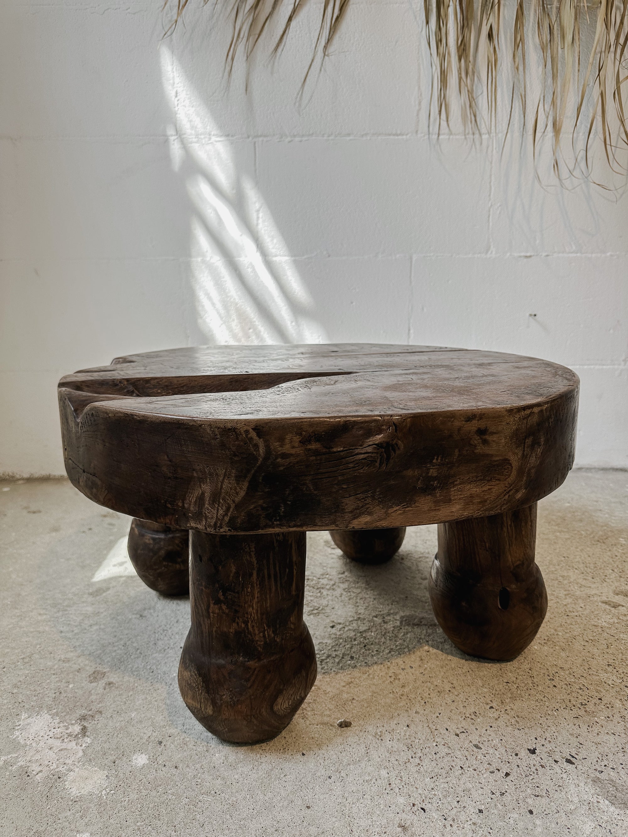 The teak ball coffee table