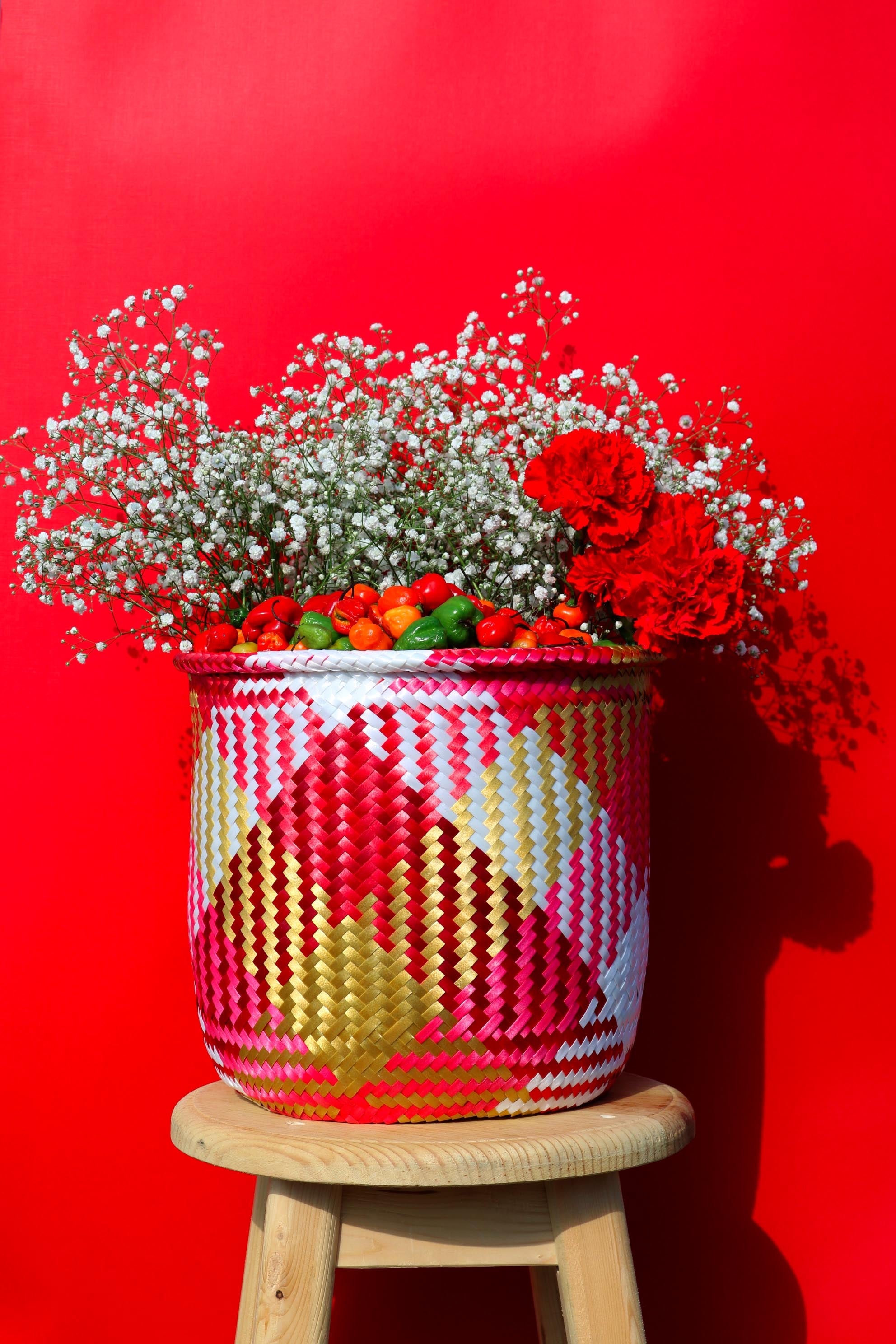 handwoven plastic basket red-gold-white