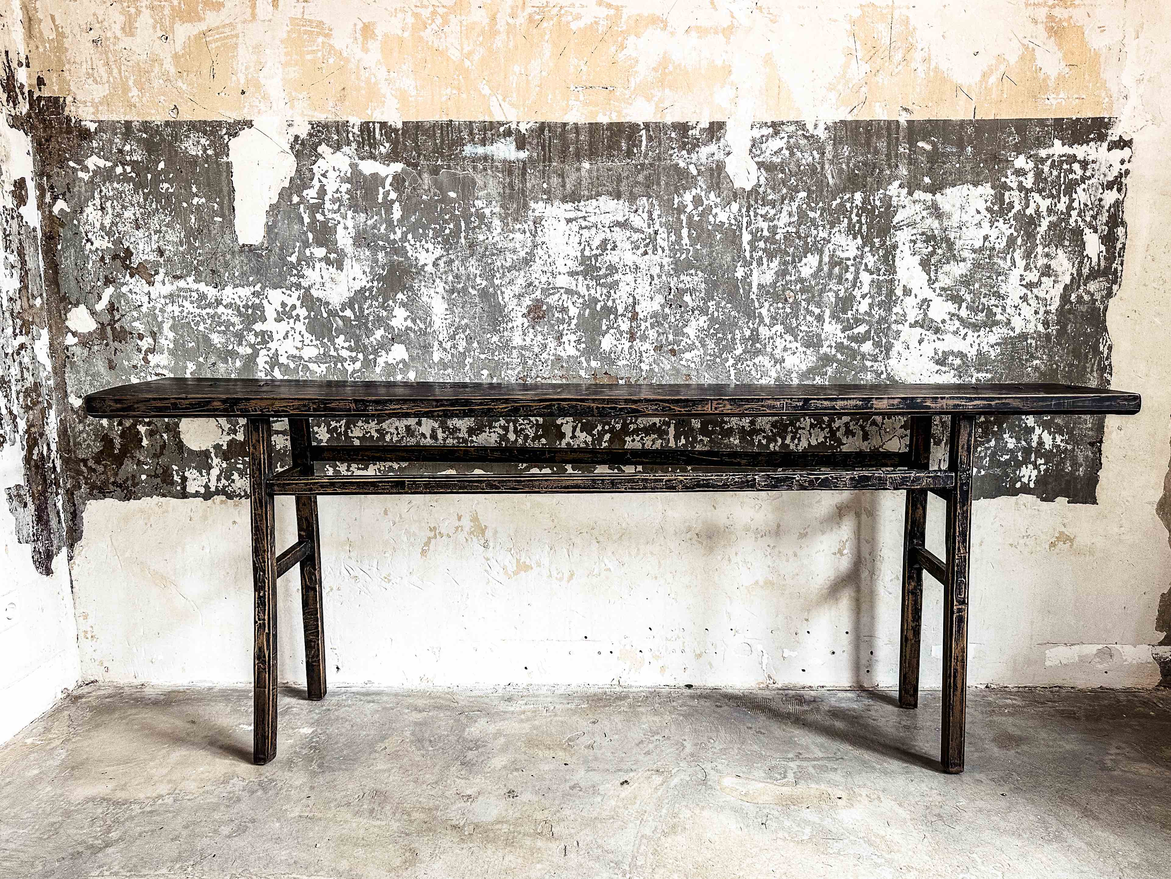 The antique black console table