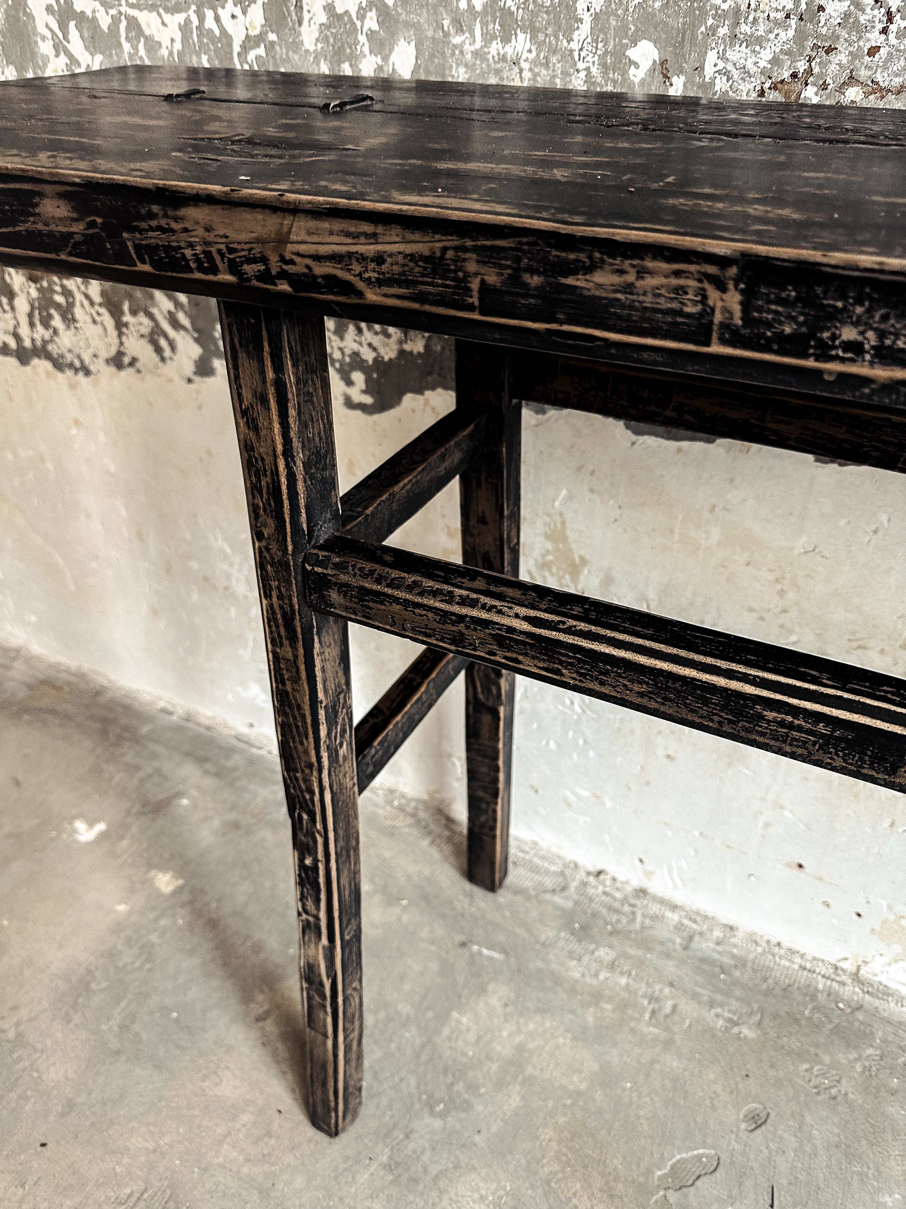 The antique black console table