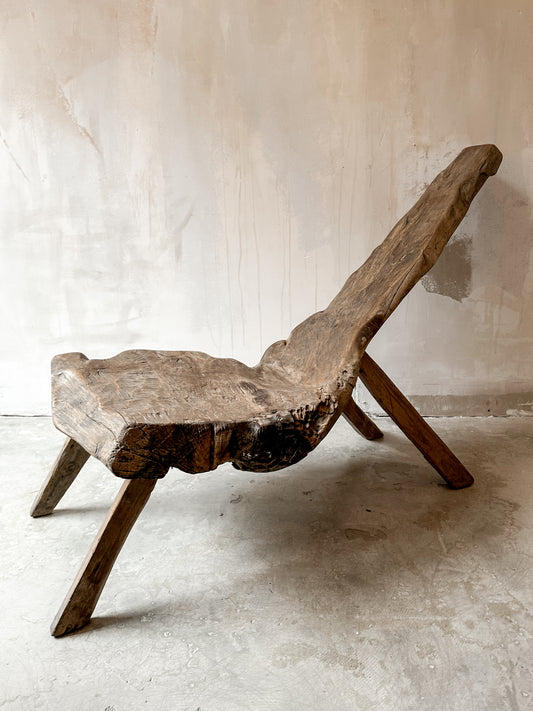 The primitive teak chair