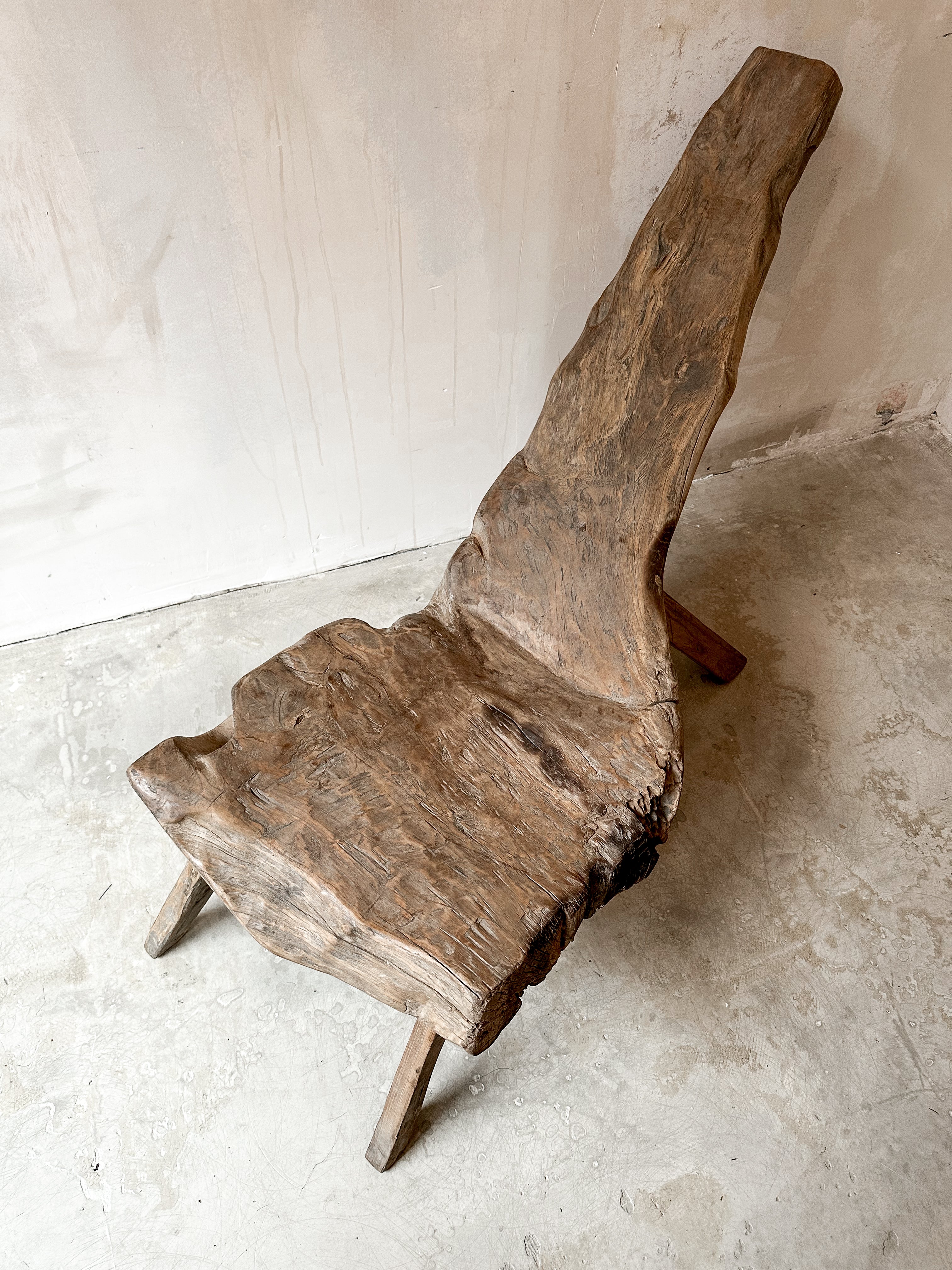 The primitive teak chair