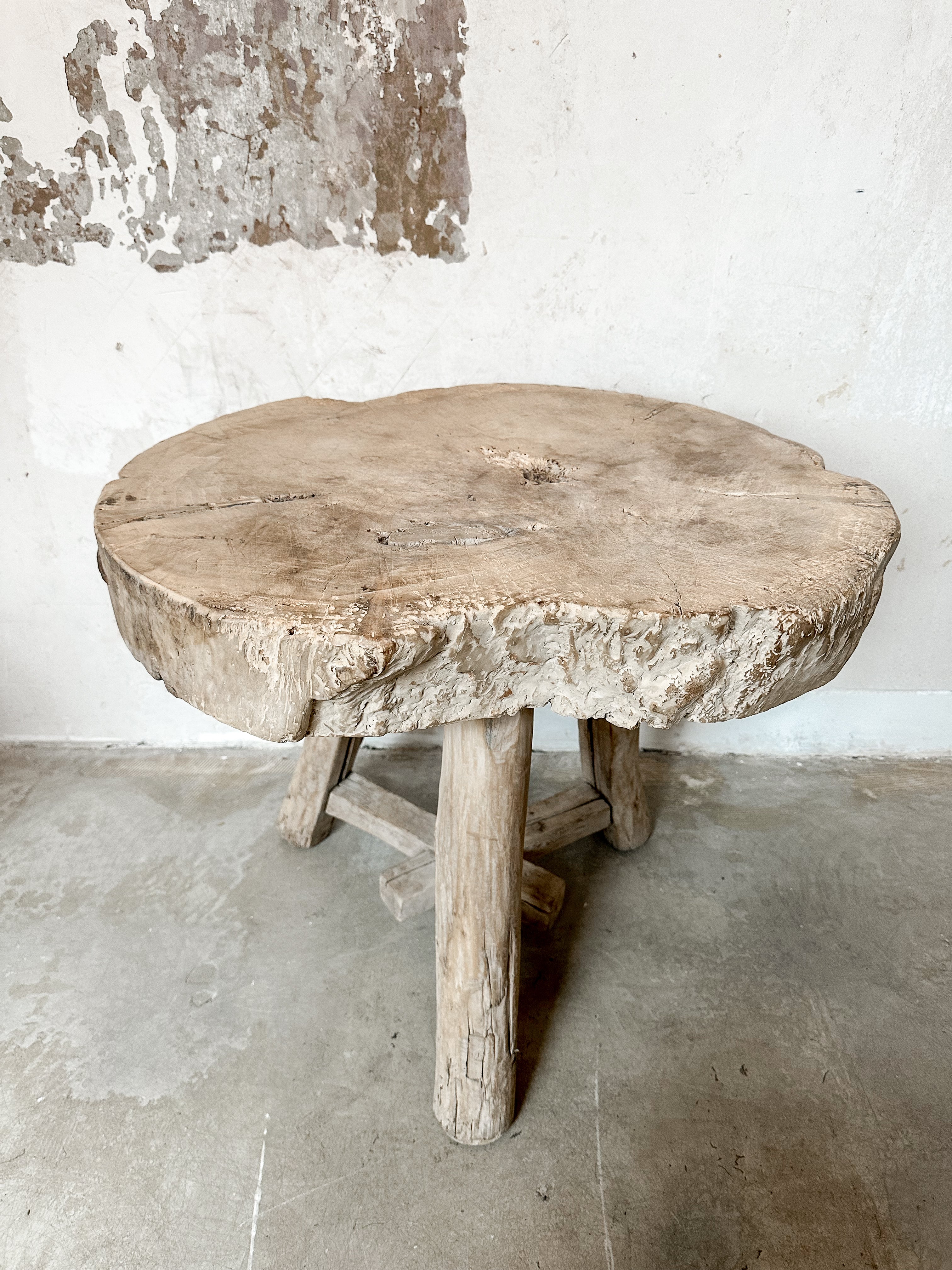 The rustic white side table