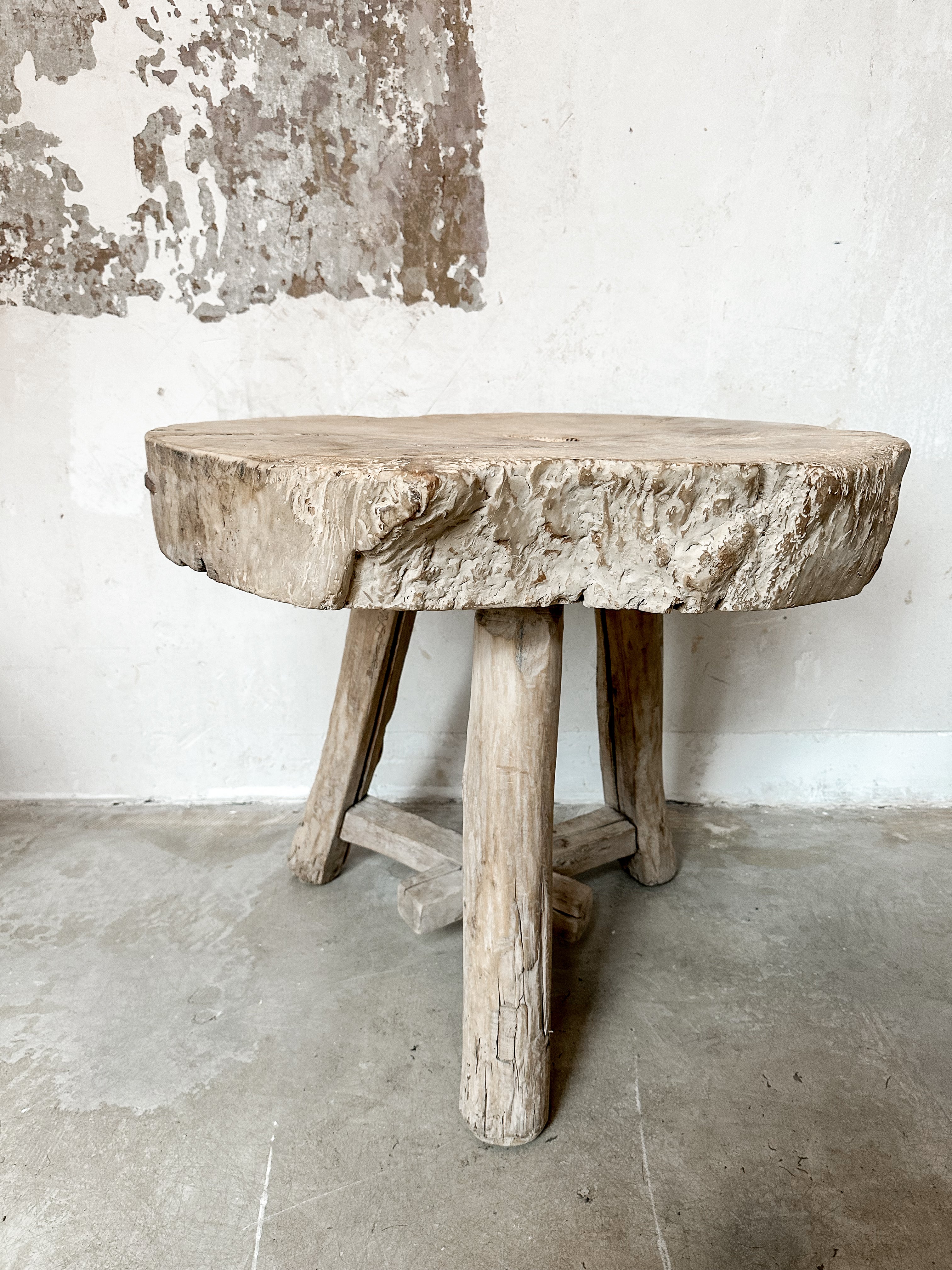 The rustic white side table