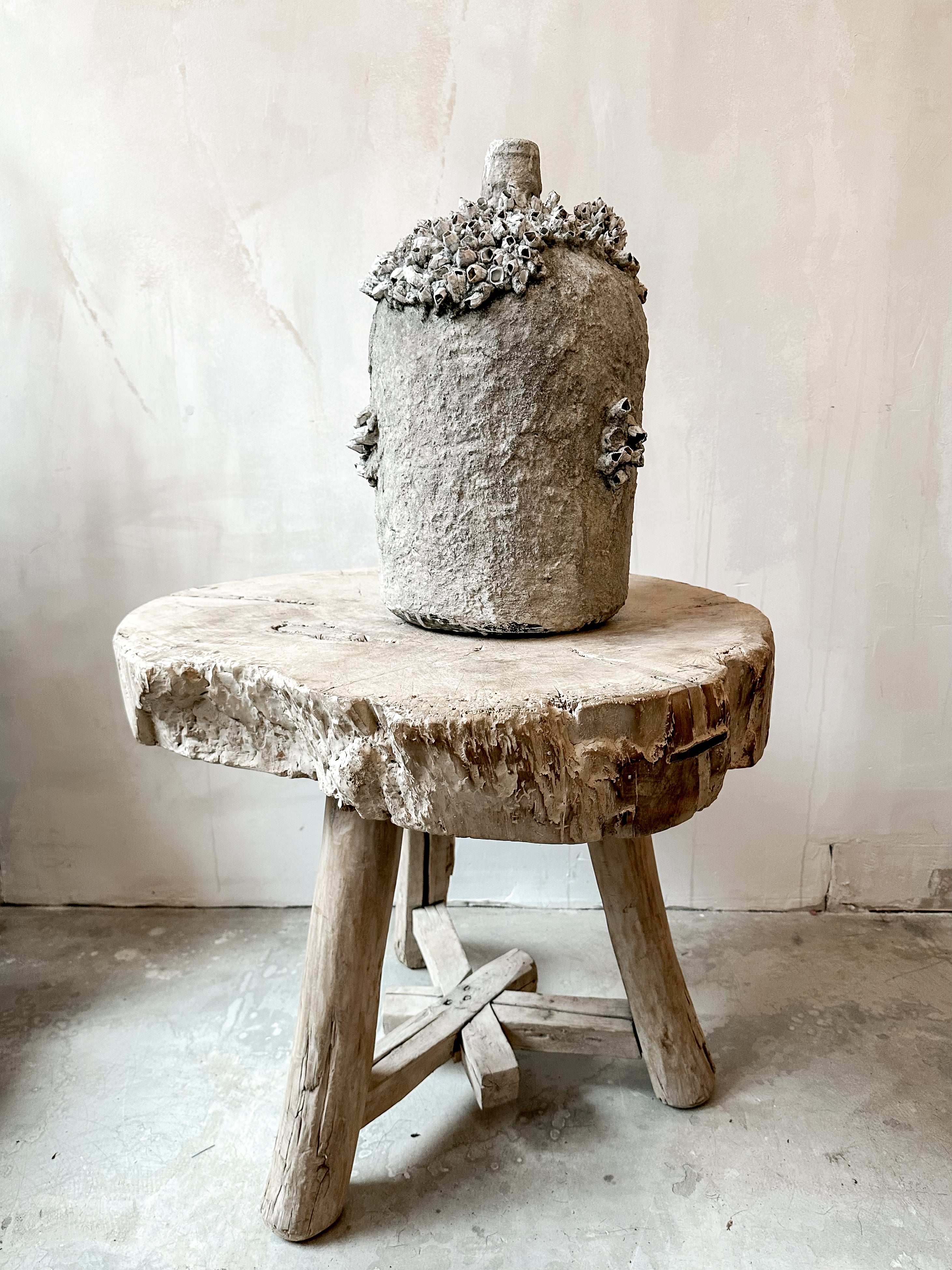 The rustic white side table