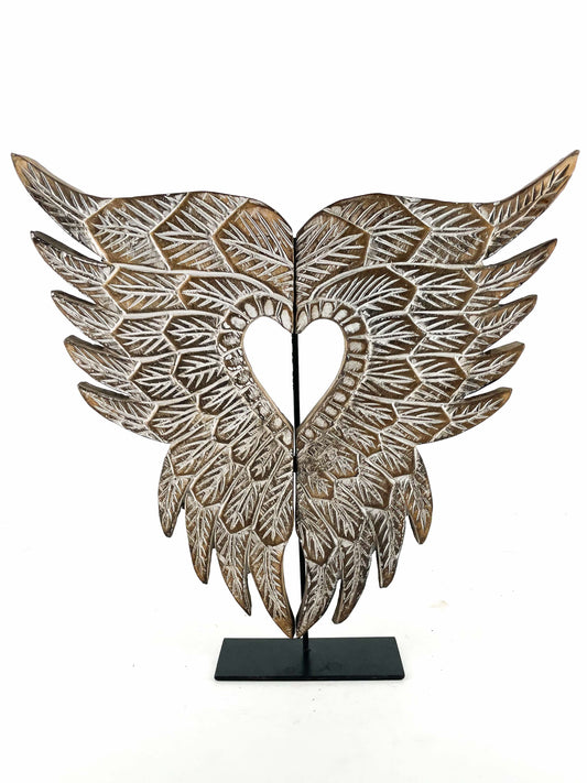 hand carved angel wings on metal stand