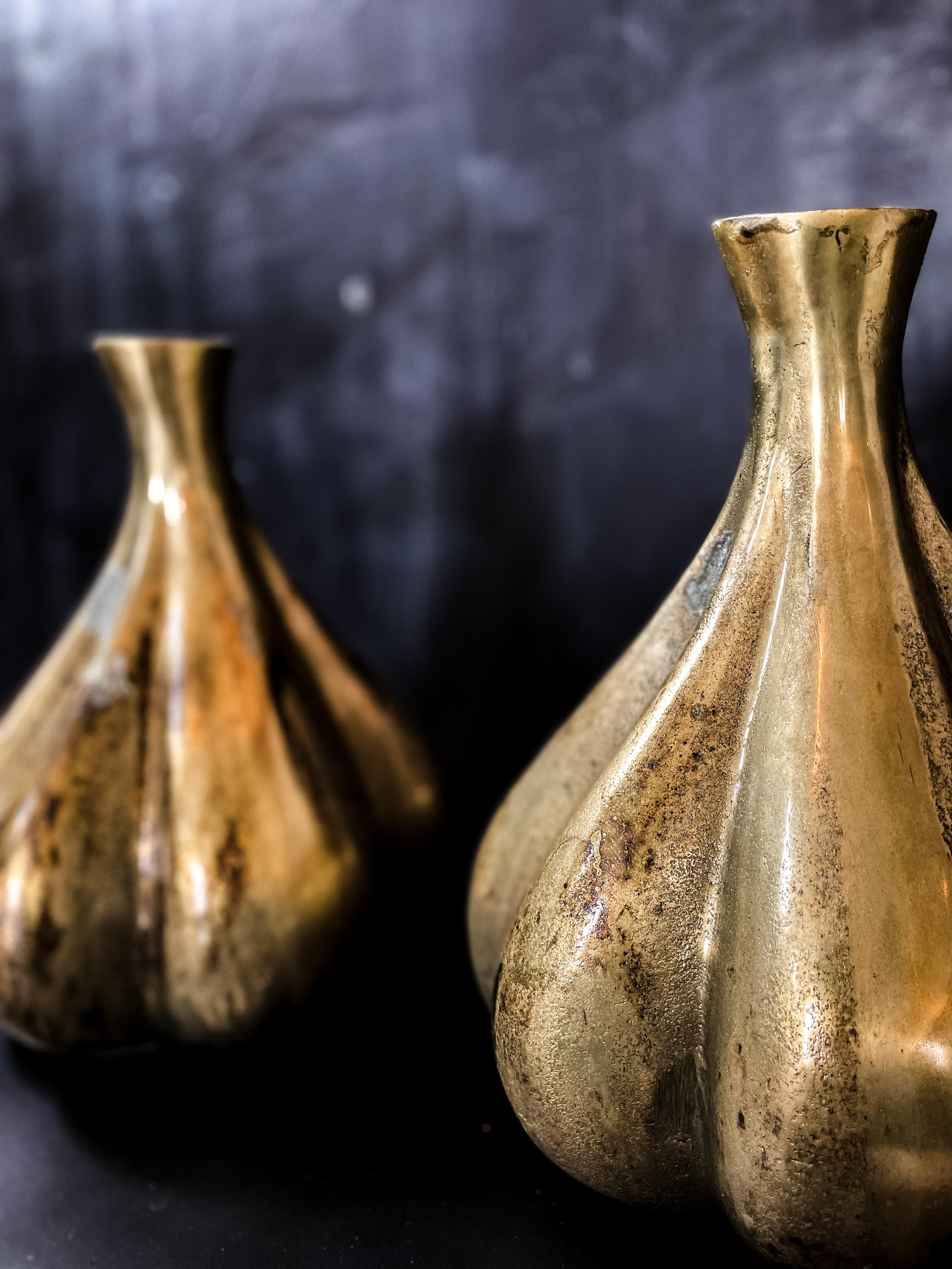 Gold-colored aluminum vase